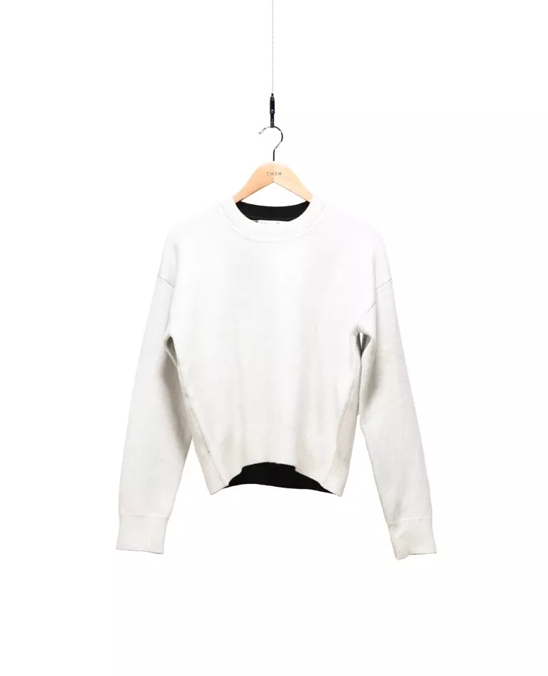 Dior white cashmere pullover front in a full white background