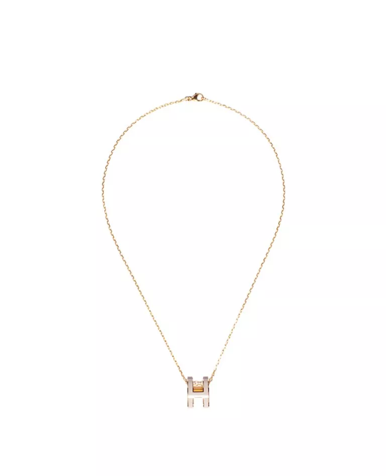 Hermes pop h pendant milk tea and gold hardware front in a full white background