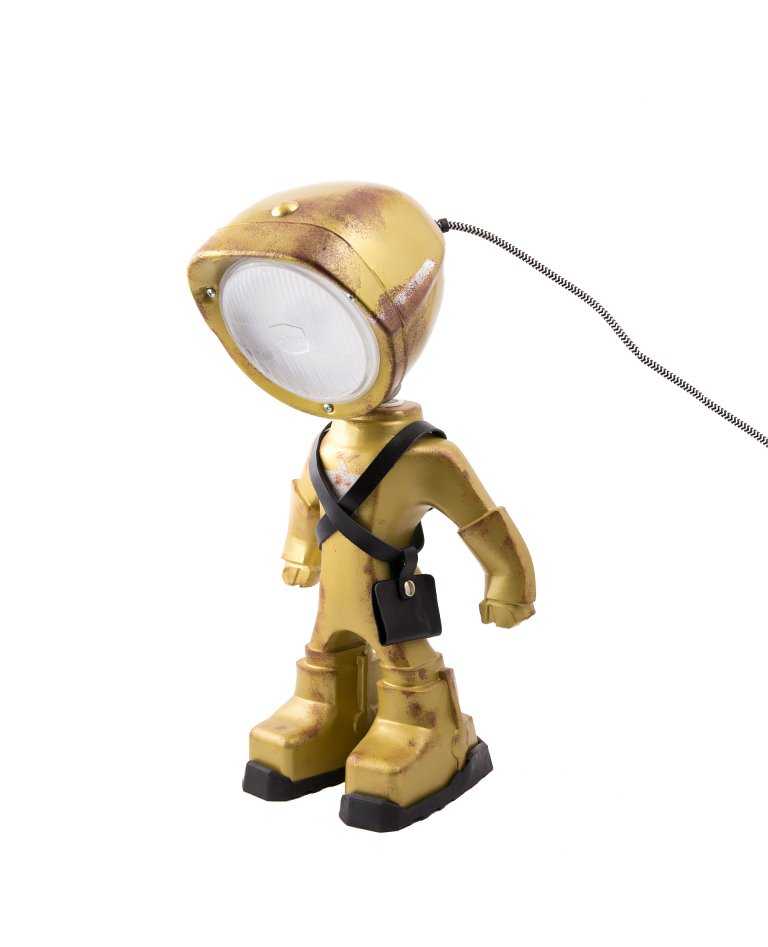 The Lampster gold Army figure lamp front with black leather accessories and light off